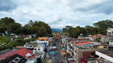 Aerial view of This bridge has a length of 90 metres and width of 3.8 metres connecting the fortress of Fort De Kock and Bukittinggi Zoo. Limpapeh bridge. Bukittinggi, Indonesia, January 25, 2023