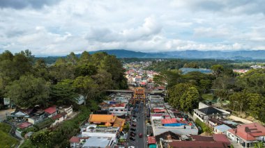 Aerial view of This bridge has a length of 90 metres and width of 3.8 metres connecting the fortress of Fort De Kock and Bukittinggi Zoo. Limpapeh bridge. Bukittinggi, Indonesia, January 25, 2023
