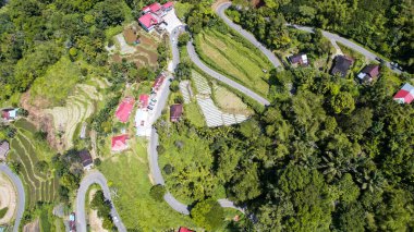 Aerial view of Kelok 44. Tuning 44 is a unique street located in the religion district, reviewer. West Sumatra, Indonesia, January 26, 2023