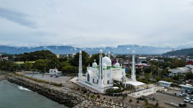 Aerial view of Al-Hakim Mosque Largest Masjid in Padang, Ramadan Eid Concept background, Beautiful Landscape mosque, Islamic background Mosque, Travel and tourism. Padang, Indonesia, January 26, 2023