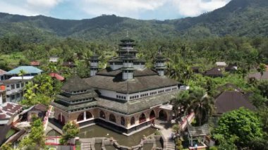 Aerial view of Raya Bayur Mosque Largest Masjid in Nagari Bayur, Tanjung Raya, Agam Regency. Ramadan Eid Concept background, Islamic background Mosque, west sumatra, Indonesia, March 4, 2023