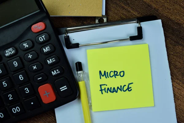Concepto Micro Finanzas Escribir Notas Adhesivas Con Calculadora Aislada Tabla —  Fotos de Stock
