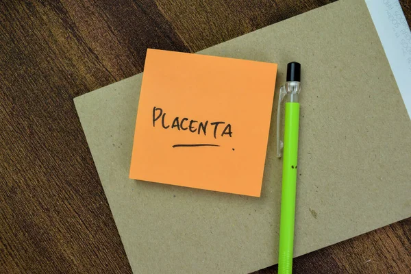 Concepto Placenta Escribir Notas Adhesivas Aisladas Mesa Madera —  Fotos de Stock