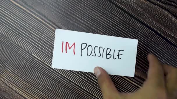Concept Impossible Possible Write Sticky Notes Izolated Wooden Table — Videoclip de stoc