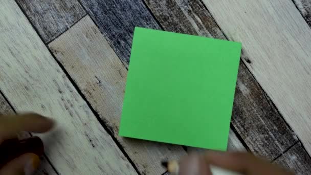 Concept Science Write Sticky Notes Isolated Wooden Table — Stock Video