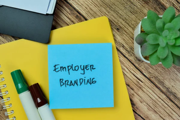 stock image Concept of Employer Branding write on sticky notes isolated on Wooden Table.