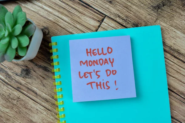 stock image Concept of Hello Monday Let's Do This! write on sticky notes isolated on Wooden Table.