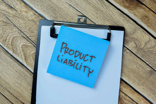 stock image Concept of Product Liability write on sticky notes isolated on Wooden Table.