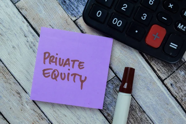 Concept of Private Equity write on sticky notes isolated on Wooden Table.