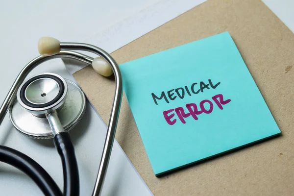 Concept of Medical Error write on sticky notes isolated on white background.