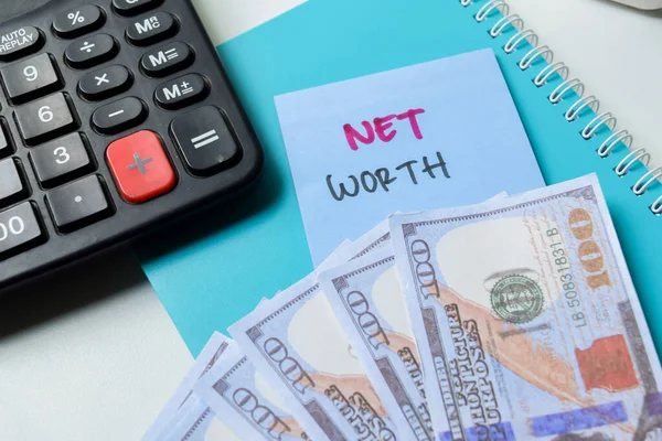 Concept of Net Worth write on sticky notes isolated on white background.