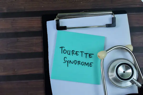 Concetto Sindrome Tourette Scrivere Note Appiccicose Con Stetoscopio Isolato Tavolo — Foto Stock