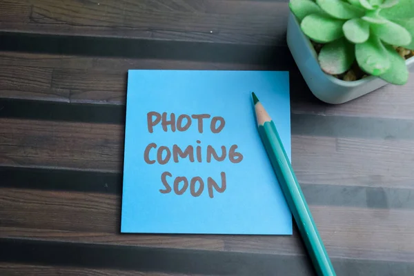 Concept Photo Coming Soon Write Sticky Notes Isolated Wooden Table — Stockfoto