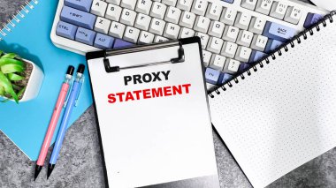 Concept of Proxy Statement write on paperwork isolated on Wooden Table. clipart