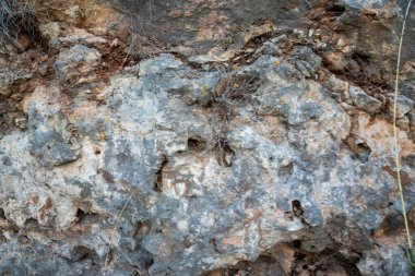 Doğal kaya duvarı, kahverengi, turuncu, gri renkler..