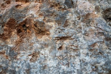 Doğal kaya duvarı, kahverengi, turuncu, gri renkler..