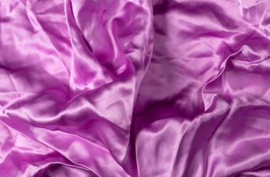 Mor / Pembe kırışık kumaş arkaplan.
