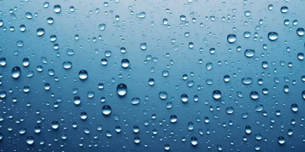 Gotas Água Superfície Fundo Azul Claro — Fotografia de Stock