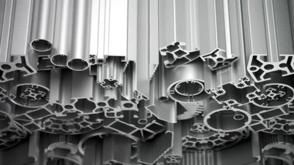 複雑な軽量突き出されたアルミニウム金属のプロフィールの無限のループ 一般に構造および製造の材料として使用される 興味深い 芸術的 抽象的なパターンに積み重ねられたリソース — ストック動画