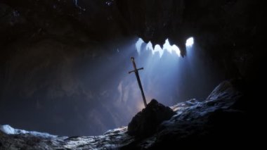 Excalibur, Kral Arthur 'un ünlü, efsanevi çelik kılıcı. Karanlık mağaradaki ışık ışınları ve toz özellikleriyle taşın içindeki kılıç. Karanlık, gizemli atmosferik animasyon. 4k