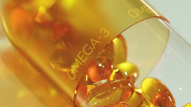 大黄色半透明凝胶胶囊 内含较小的欧米茄3 维生素D 鱼油或鳕鱼肝油丸 关闭维生素补充剂 健康的生活方式 药物概念 — 图库视频影像
