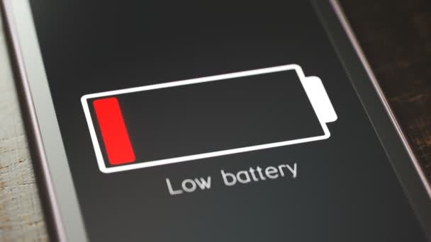Smartphone Screen Showing Notification Low Battery Status Warning Message Flashing — Stock Video