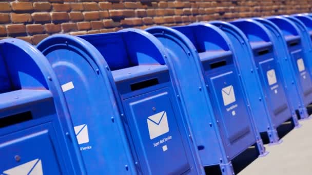 Blue Mailboxes Standing Endless Row Old Brick Wall Clear Sunny — Stock Video