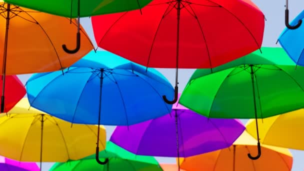 Countless Colourful Umbrellas Hanging Street Clear Blue Sky Visible Them — Stock Video