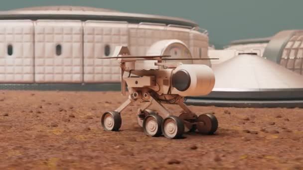 惑星のローバーが 宇宙基地に向かってる 太陽光発電ロボットは岩の砂漠を高速に移動する テスト車両は宇宙基地に戻る 宇宙研究 サイエンスミッション — ストック動画