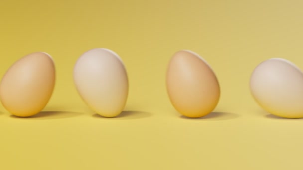 노란색 파스텔 배경에 계란을 롤링의 원활한 애니메이션 행복한 부활절 방향으로 — 비디오