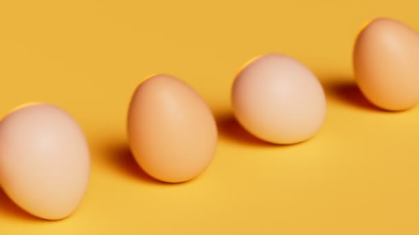 Płynna Animacja Toczących Się Jaj Żółtym Pastelowym Tle Szczęśliwej Wielkanocy — Wideo stockowe
