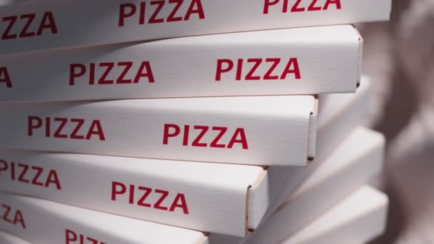 ボール紙のピザ箱の巨大な山のシームレスなループアニメーション ピザカートンのスタック ファストフードの包装 ピザ箱を取り出して ペーパーホワイトピザボックス ピザの配達コンセプト ピザ包装について — ストック動画