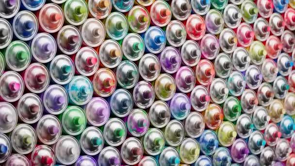Multiple Colorful Spray Paint Cans Stacked Endless Pattern Camera Moving — Stock Video