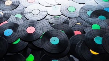 Sonsuz plak kayıtları olan kusursuz döngü animasyonu. Müzik kayıtları. Retro ses. Klasik plaklardaki ses albümleri. Gramofon plak koleksiyonu. Müzik tutkusu. Favori şarkılar.