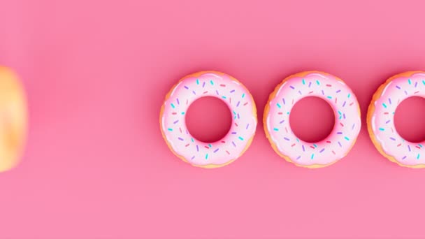 Φουσκωτά Δαχτυλίδια Μοιάζουν Ντόνατς Ροζ Φόντο Ρεαλιστικές Πολύχρωμες Φουσκωτές Σημαδούρες — Αρχείο Βίντεο
