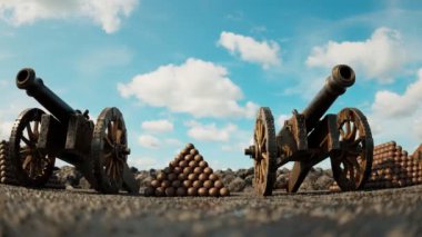 Silahlı vintage topların bitmek bilmeyen döngüsü ateşe hazır. Savaş sırasında kirli, ıslak bir savaş meydanı. Arka planda güneşli mavi gökyüzü olan bir savaş. Top topları namluya yüklenmeye hazır..