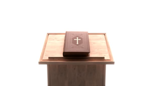 美丽的圣经上的木制桌子与明亮的白色背景 精美的好书 装饰有图案和十字架 上帝的书面文字 宗教信仰 基督教书籍 — 图库视频影像