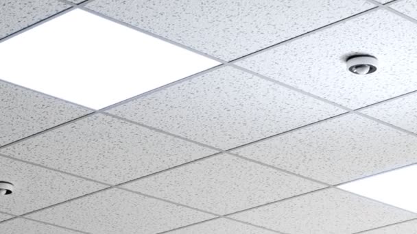 用运动检测器和灯对悬吊的天花板进行无限的透视 当检测到运动时 前面的灯自动打开 自动照明控制 能源效率 — 图库视频影像