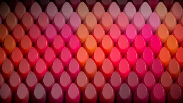 口红色斑排列整齐 不同色度的口红样品在无缝循环中的贴士 美容院或化妆艺术家的完美样品或背景 顶部视图 — 图库视频影像