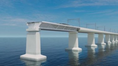Okyanus üzerinde bir demiryolu köprüsü inşa ediliyor. Yapısal elementler bir araya gelerek tam bir köprü oluştururlar. Kamera inşaat alanına doğru hareket ediyor..
