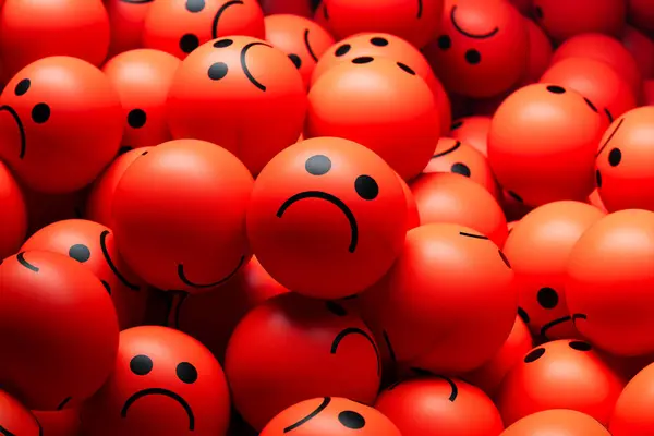 Velká Hromada Červených Koulí Smutnými Nebo Rozzlobenými Výrazy Hromada Barevných — Stock fotografie