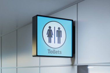 Havalimanı terminalleri, hastaneler, otobüs veya tren istasyonları gibi kamusal alanlardaki tuvaletlerin girişini açıkça gösteren parlak bir tabela. Erkekler ve kadınlar tuvaleti..