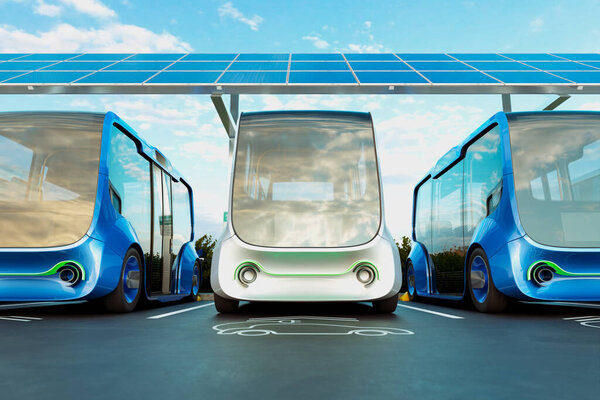 Электростанция зарядки автомобилей. Микроавтобусы остановились на парковке, чтобы зарядить аккумуляторы. Концепция экологически чистого автомобиля. Электромобили подключаются к электричеству. Электромобильность.