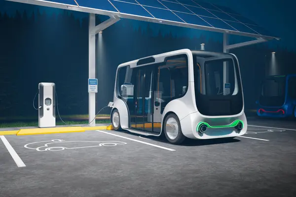 Electric minibus charging station. A vehicle stopped at the parking to charge the battery. Concept of the environment-friendly car. The electric car is plugging into electricity. Electromobility. EV