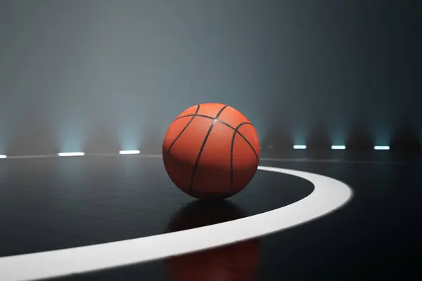 View at basketball court. A camera focused on a ball lying on black parquet. Foggy immersive lighting. Highlighted lines. Before the competition. Climatic sports event tournament.