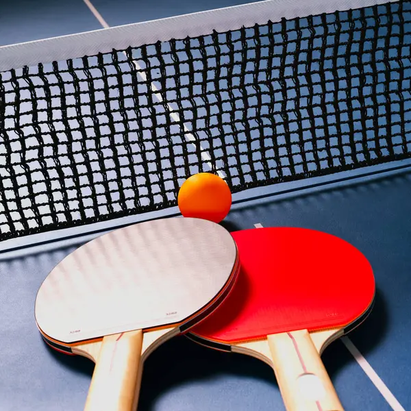 Detailed View Two Table Tennis Paddles Resting Blue Table Orange — Stock Photo, Image