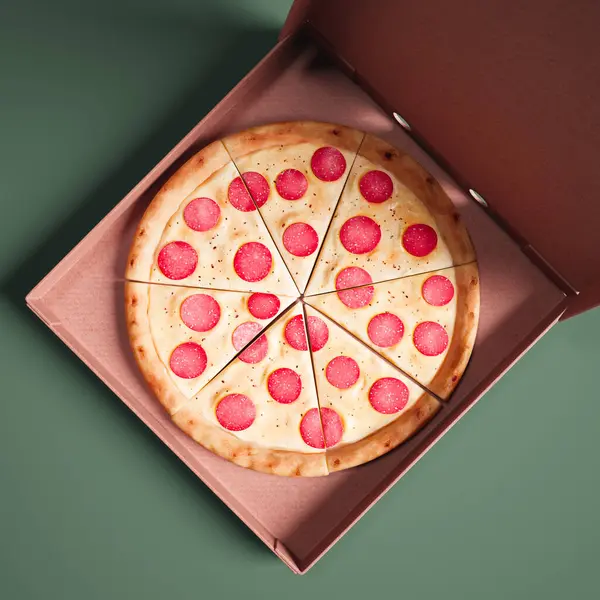 Kittlande Ovanifrån Fångar Nybakad Pepperoni Pizza Med Gooey Ost Placerad — Stockfoto