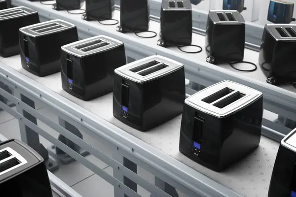 Image Captures Automated Assembly Line Black Cutting Edge Digital Toasters — Stock Photo, Image