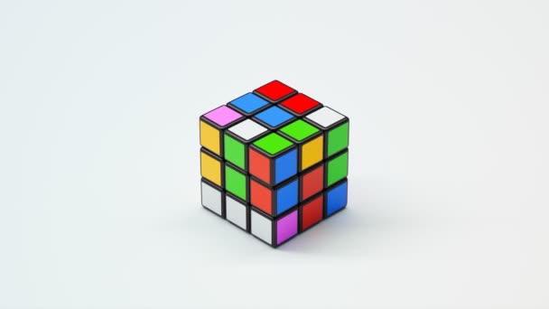 クリーンなホワイトバックドロップに鮮やかな色彩のルビックのキューブパズルの3Dデジタルイラスト 挑戦と戦略のコンセプトに最適 — ストック動画
