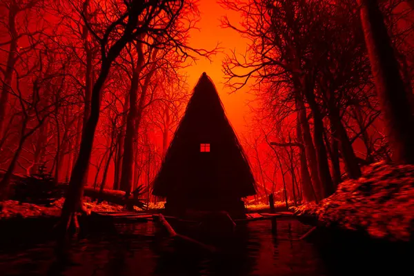 An ominous, red-lit forest engulfs a solitary cabin; its window a beacon in the night. Dense trees cast foreboding shadows, setting a scene of suspense and eeriness.